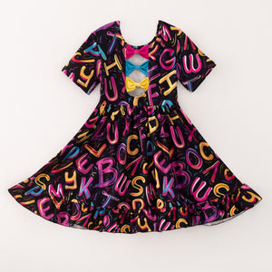 BACK TO SCHOOL NEON ALPHABETS BACK BOW DRESS
