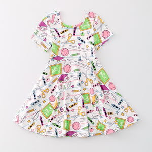 BACK TO SCHOOL SUPPLIES TWIRL DRESS