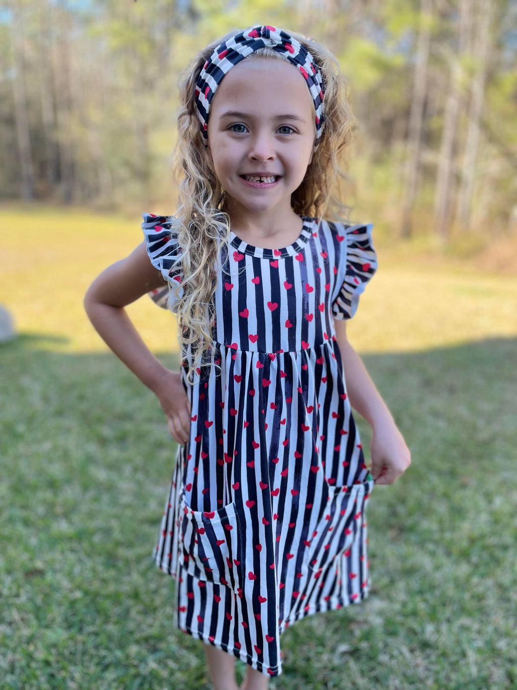 RED HEARTS WITH BLACK AND WHITE STRIPE DRESS